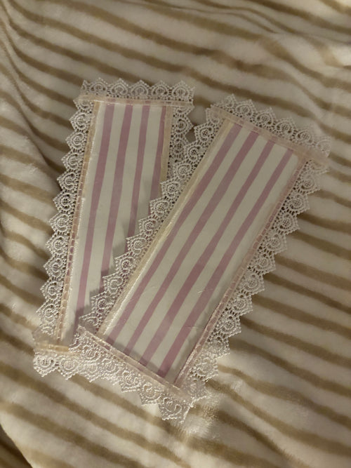 double sided pink bookmark with letters- hand-glued lace around the bookmark.♡