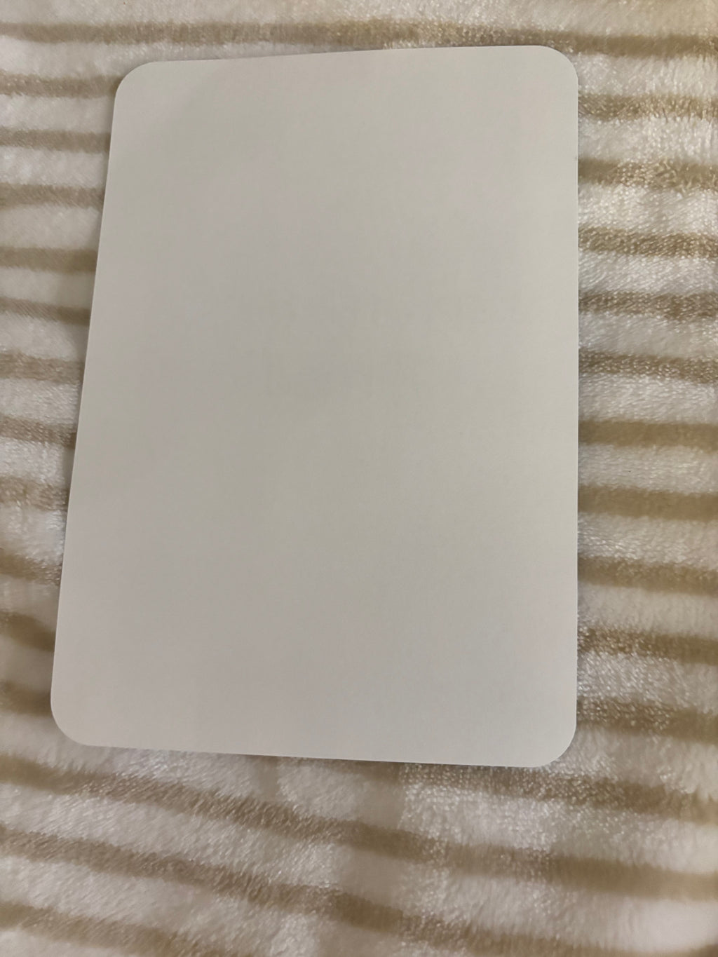 Kindle basic inserts, blue and white stripes with text.