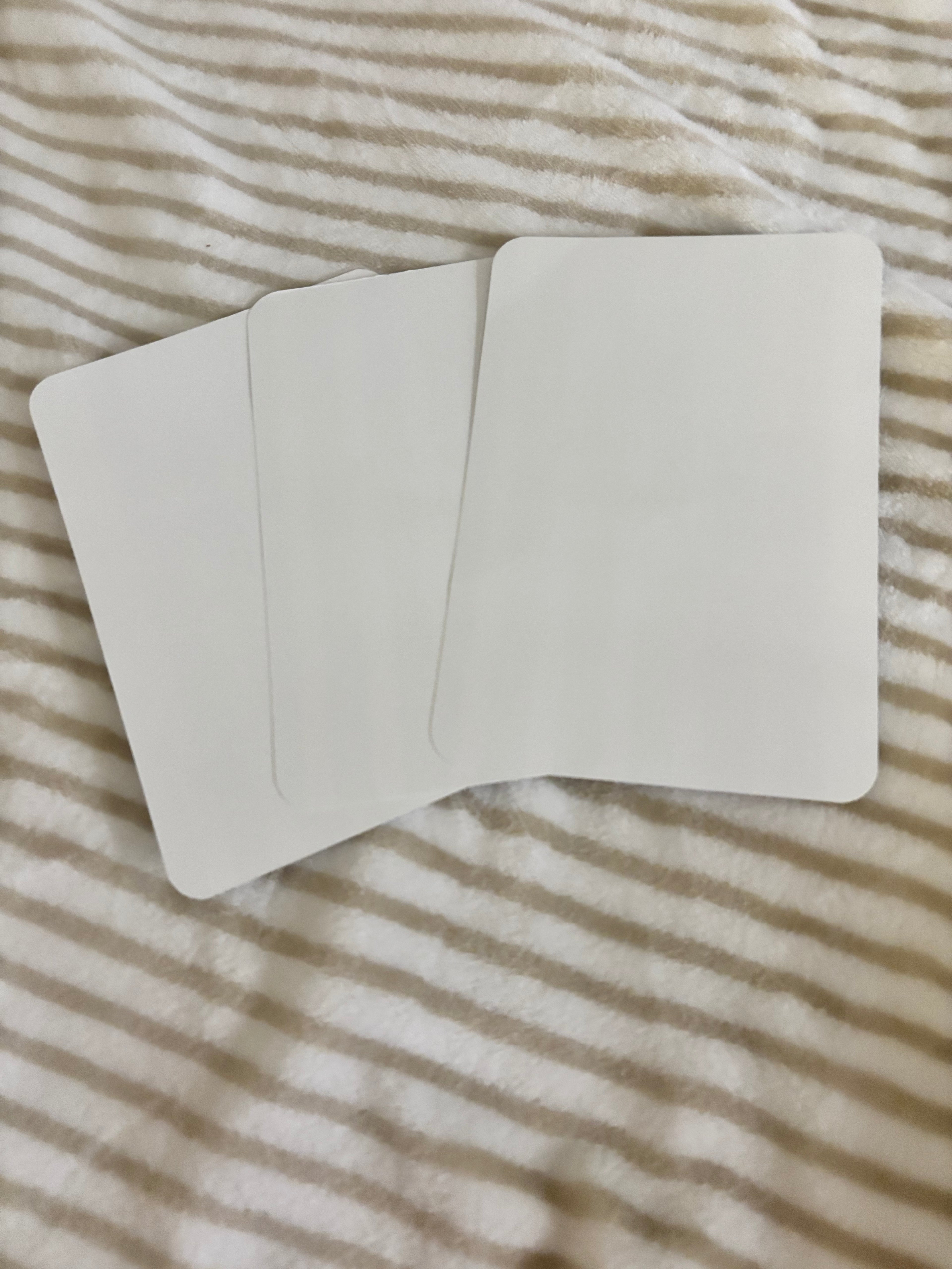 Kindle basic inserts, blue and white stripes with text.