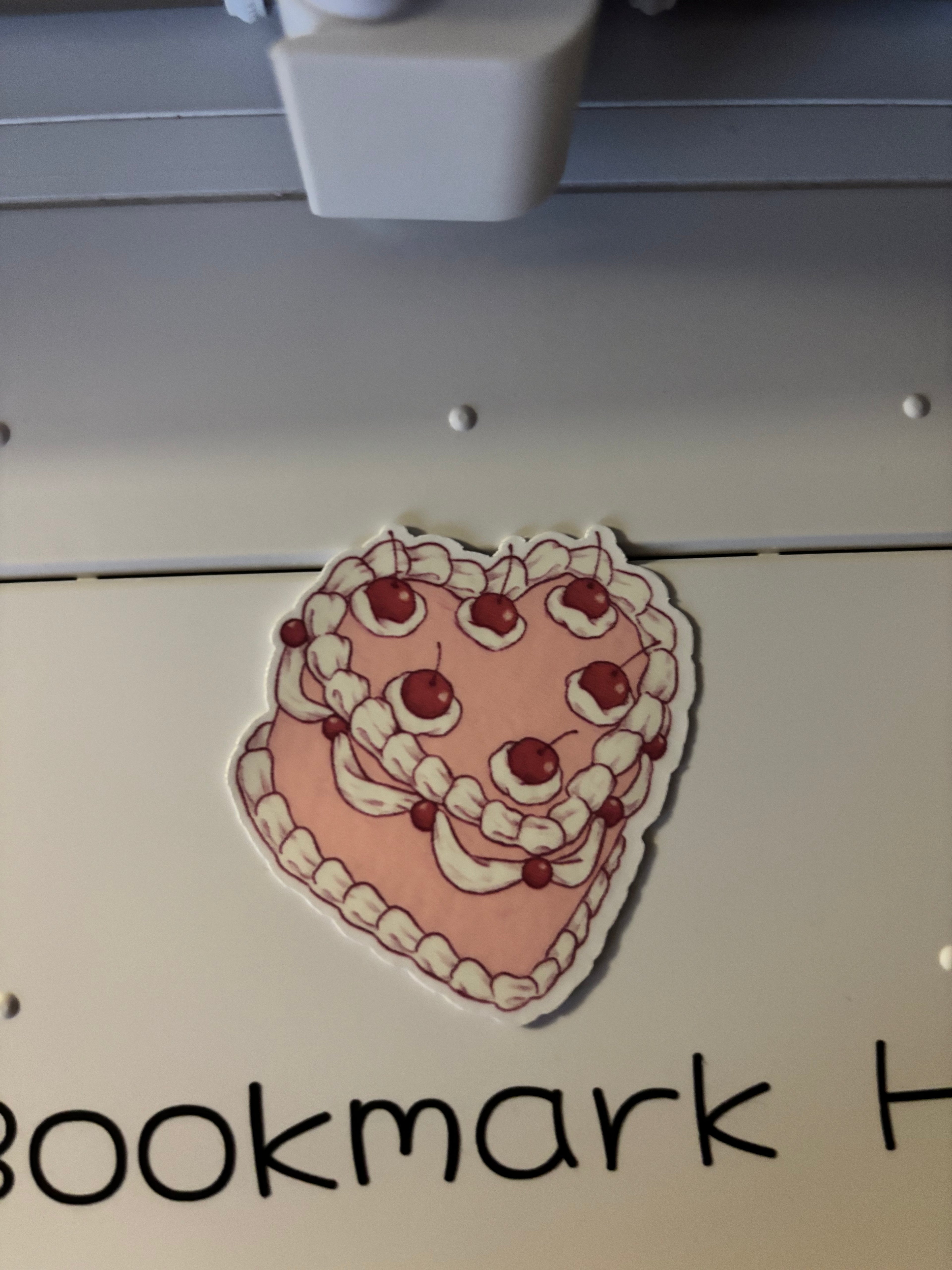 One oopsies sticker! Cute design (cake with cherries)